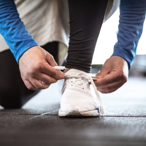 Resident getting ready for a workout in the professional-quality fitness center at Solaire 8250 Georgia in Silver Spring, Maryland