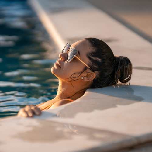 Resident in swimming pool at Vineyards at Galleria in Sparks, Nevada