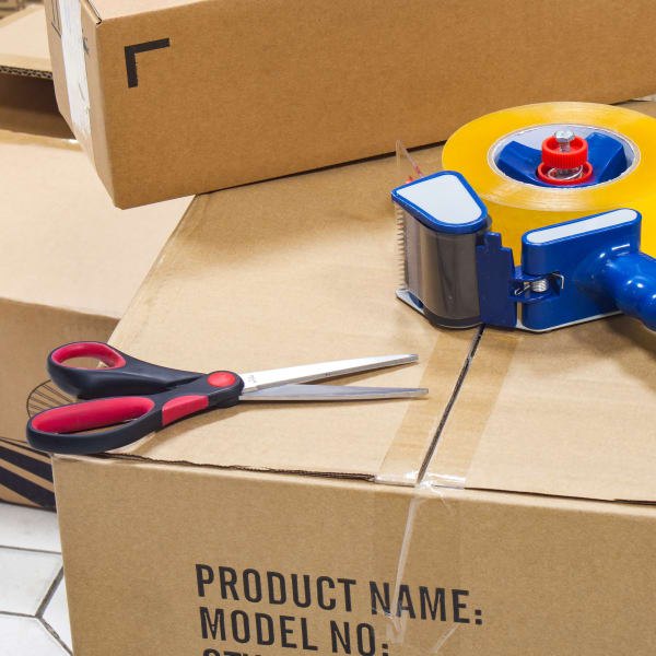 Scissors and packing tape on a box at 101 Storage in Valley Village, California