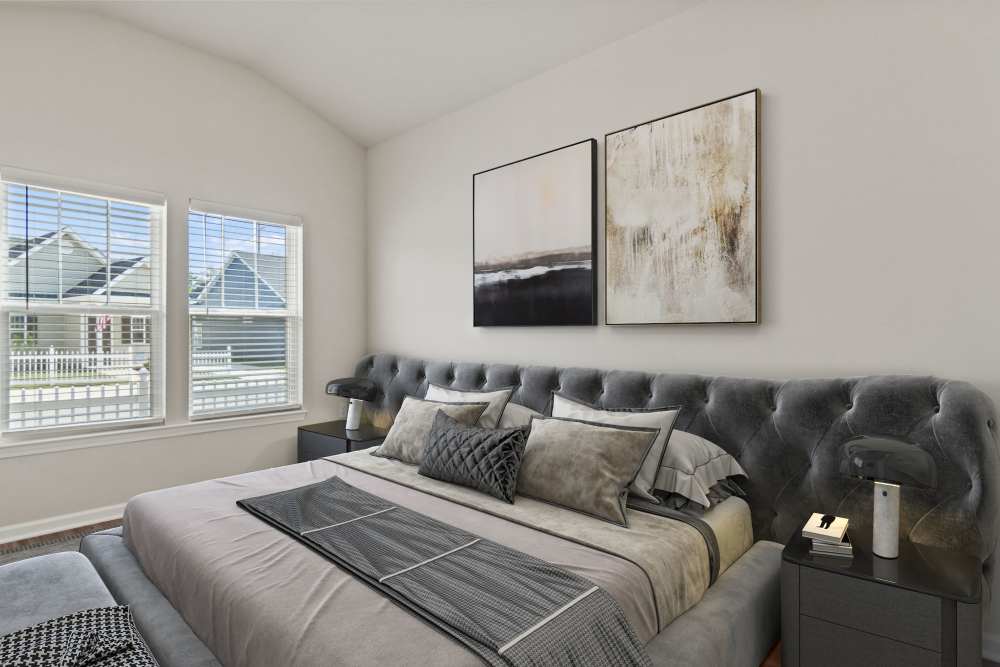 Bedroom with modern details at Crystal Lake & Kingsley Apartments and Townhomes in Fayetteville, North Carolina