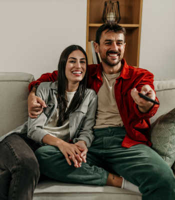  Residents on a couch at Red Knot at Edinburgh in Chesapeake, Virginia 