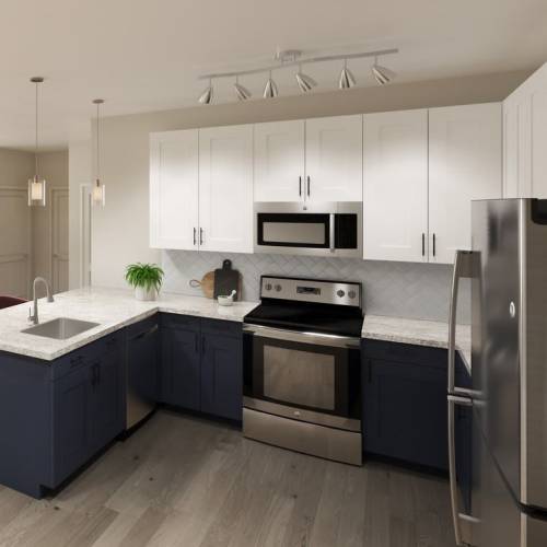 Kitchen with granite countertops at Arden at South Point Apartment Homes in McDonough, Georgia