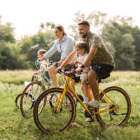 Residents riding bicycle at Ashford Lakes in Houston, Texas