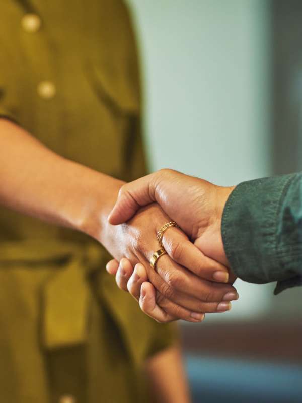People shaking hands at Darby Development in Mount Pleasant, South Carolina