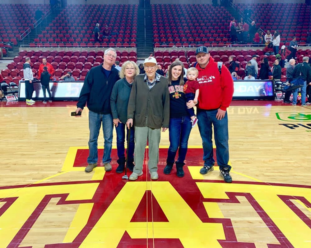 Resident Bill at a basketball game for his dare to dream event from Courtyard Estates at Hawthorne Crossing in Bondurant, Iowa.
