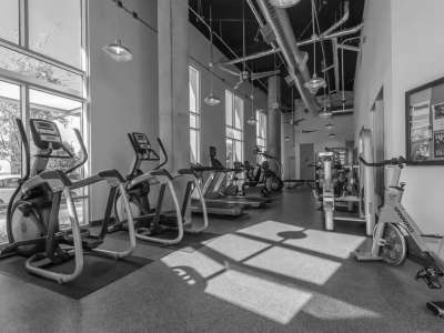 Fitness center with fully equipped materials at Flatiron District at Austin Ranch, The Colony, Texas