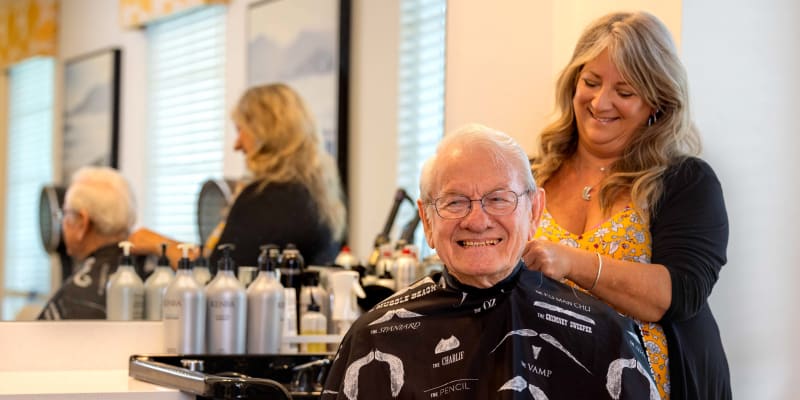 Handsome Man having his haircut at The Blake at Carnes Crossroads in Summerville, South Carolina