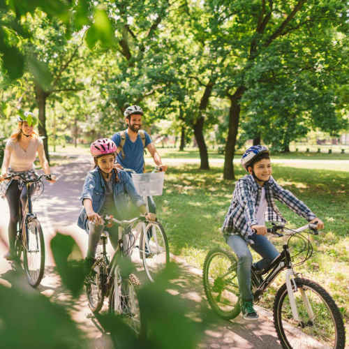 Family with his bikes in downtown at Harbor Cove Apartments in Foster City, California
