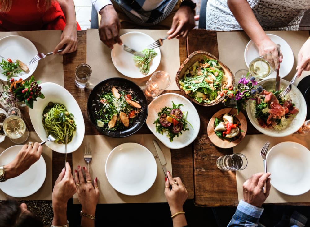 Residents enjoying a meal at Woodlake in Lakeside, California