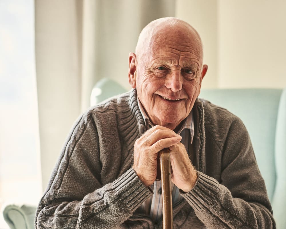 Male senior resident smiling at Maplewood at Stony Hill in Bethel, Connecticut