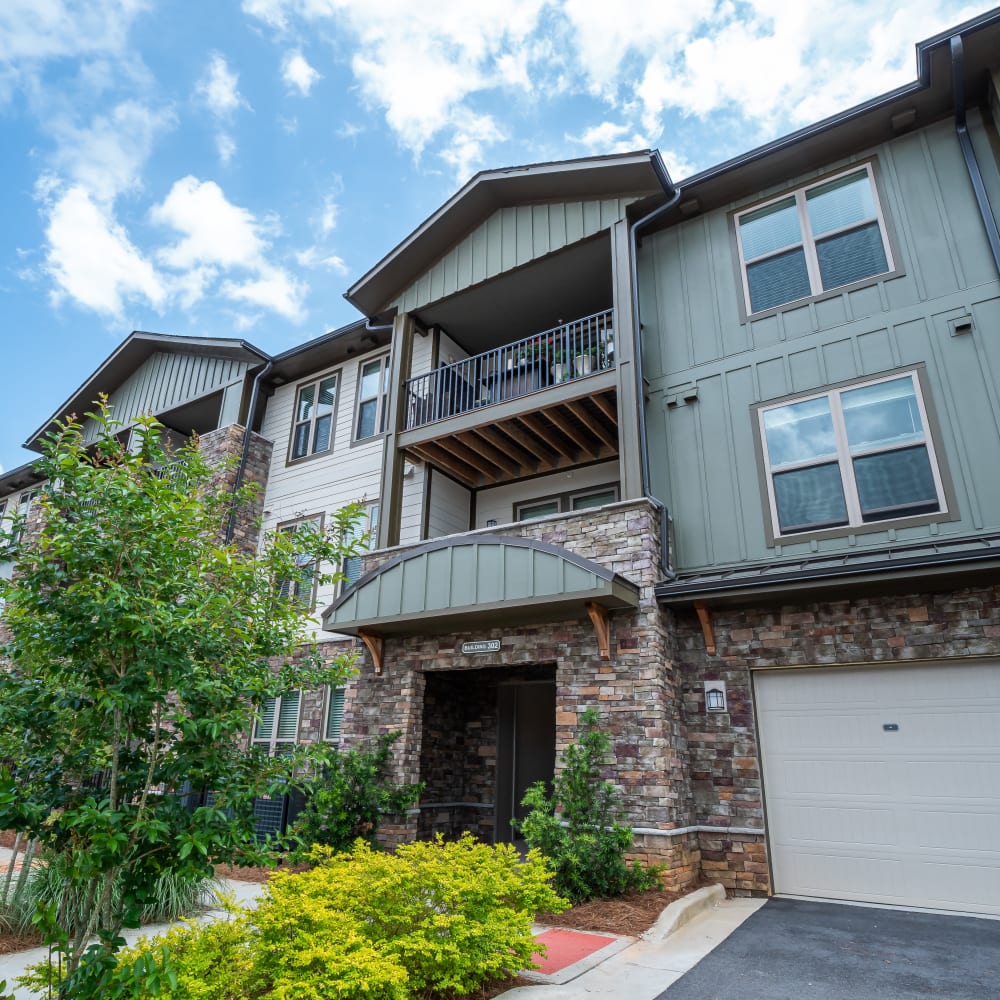 Exterior of an apartment above a garage at Retreat at Fairhope Village in Fairhope, Alabama