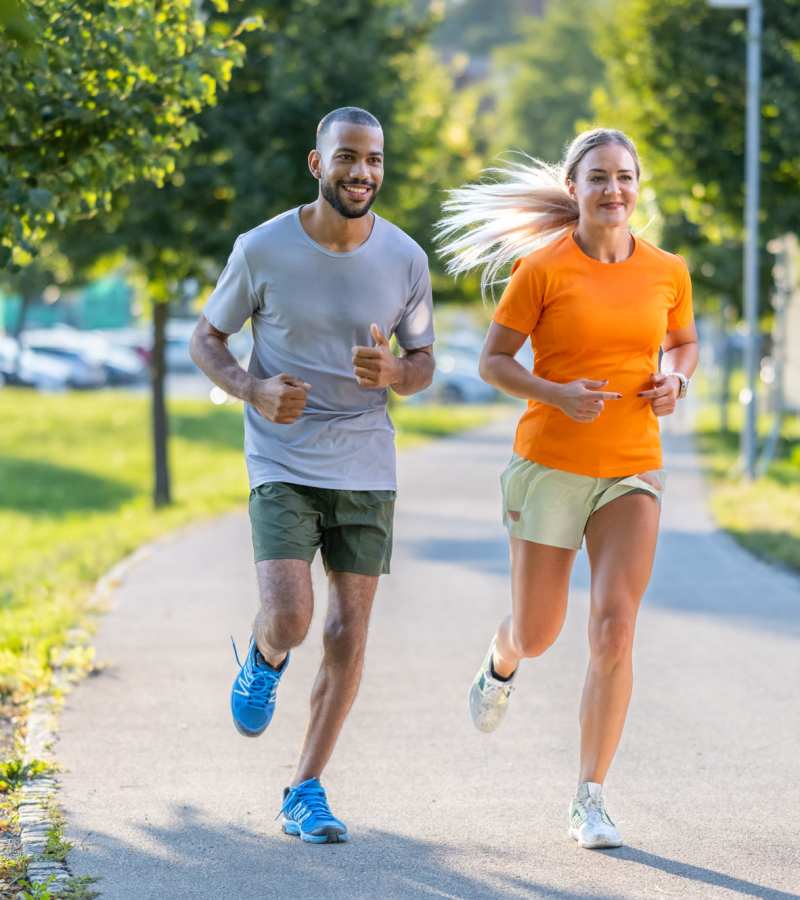 A man and woman jogging on a path in the park at Prosper 83 in Sparks, Nevada