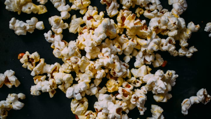 Popcorn spread over a table in a blog article on our website at Olympus Boulevard in Frisco, Texas.