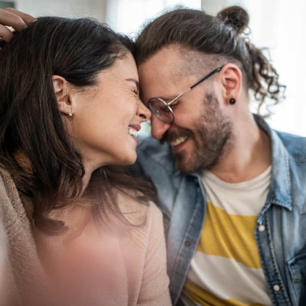 Couple in their apartment at Tucasa Townhomes in Irving, Texas