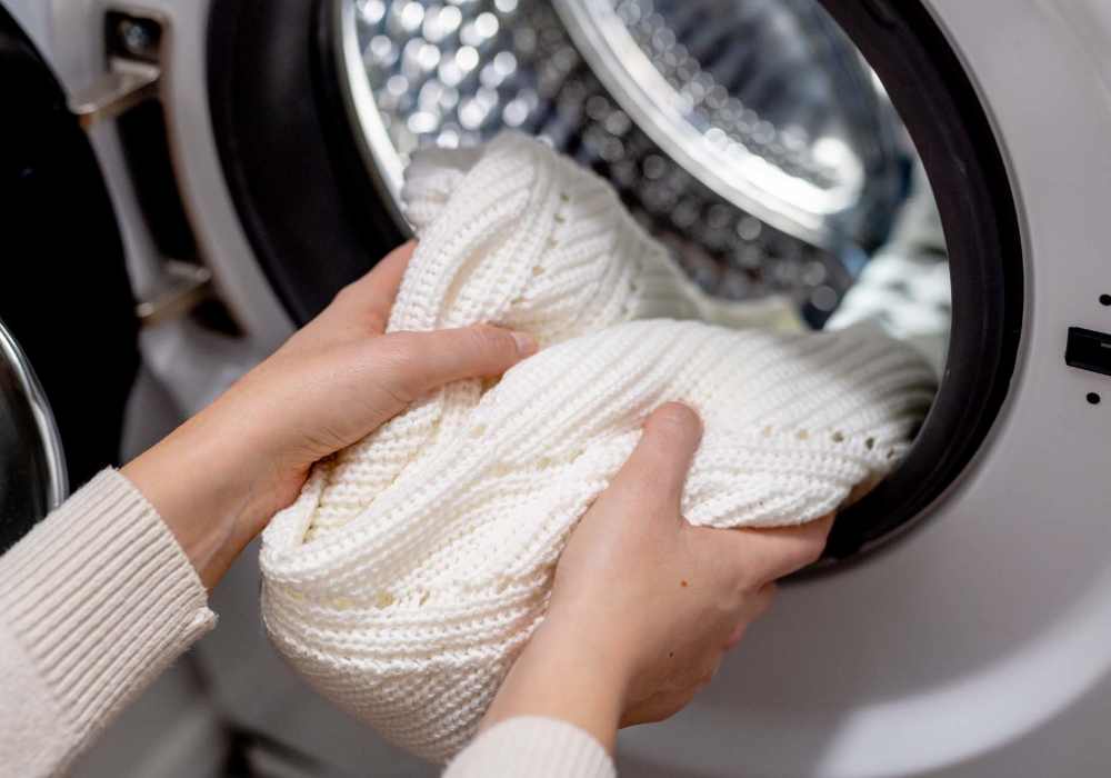A laundry room featuring a washer at Mount Vernon Arms Apartments in Merrillville, Indiana