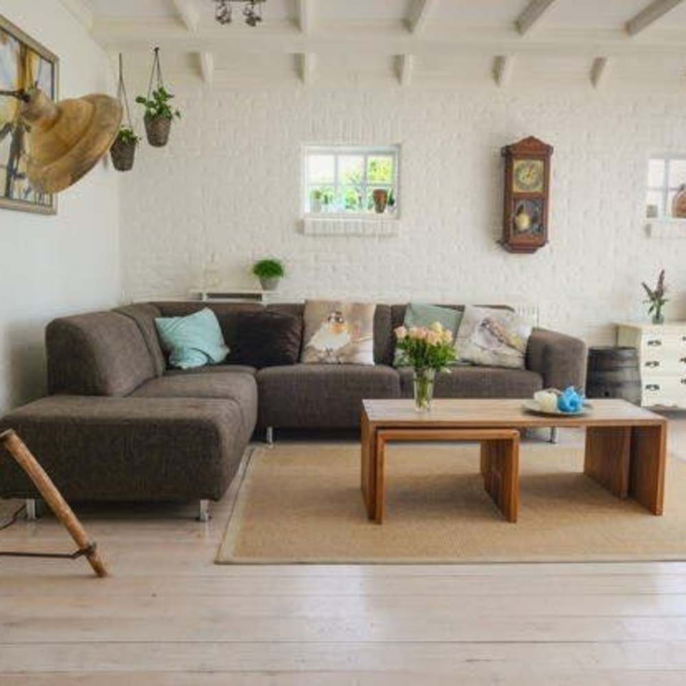 Spacious living room with wood-style flooring at Bonita Ranch in Sylmar, California,