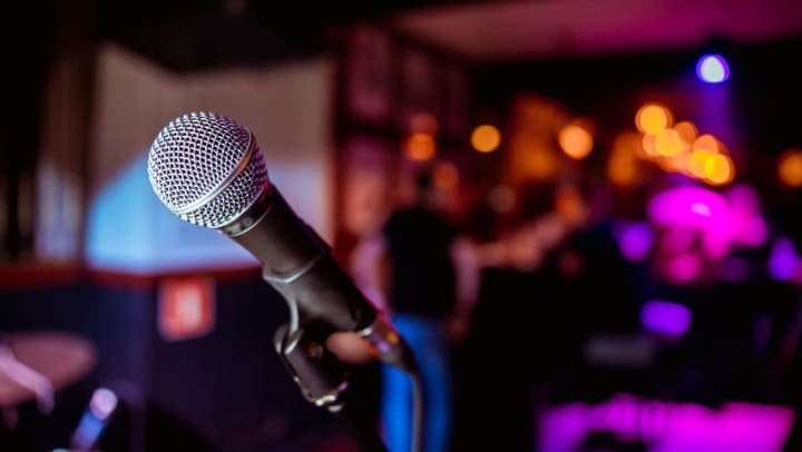 Microphone on a stage during a comedy show | comedy venues in Phoenix