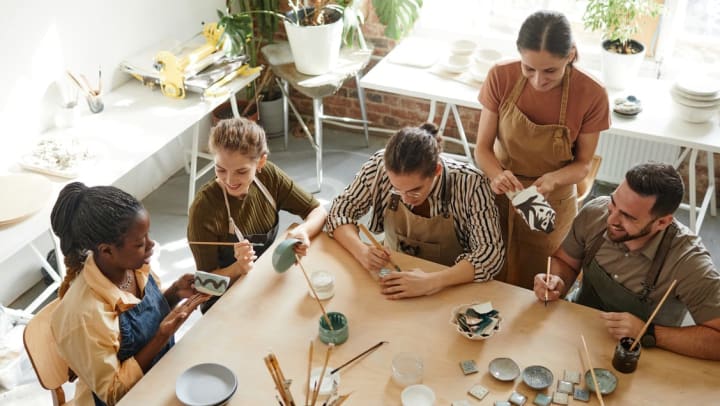 a group of people in a pottery class | Craft Workshops near Brunswick
