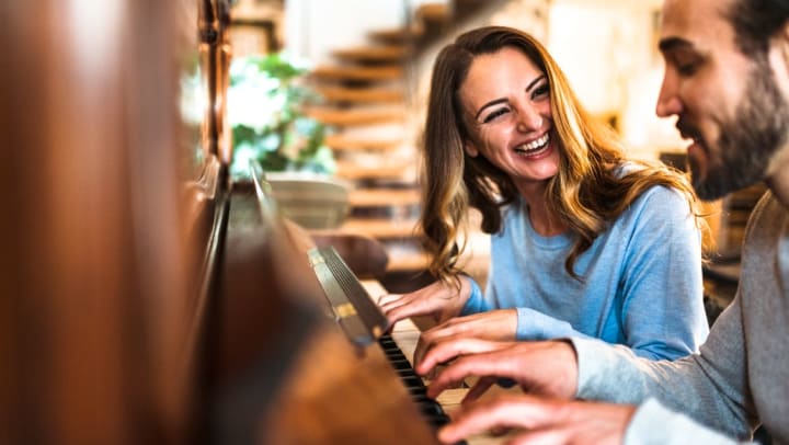 students and teacher in a piano lesson | Music Schools around Santa Fe