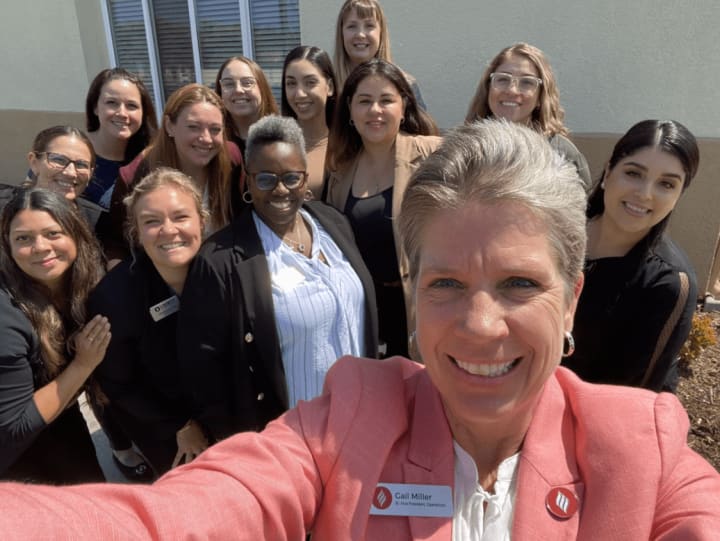Gail Miller with Liberty Team Members