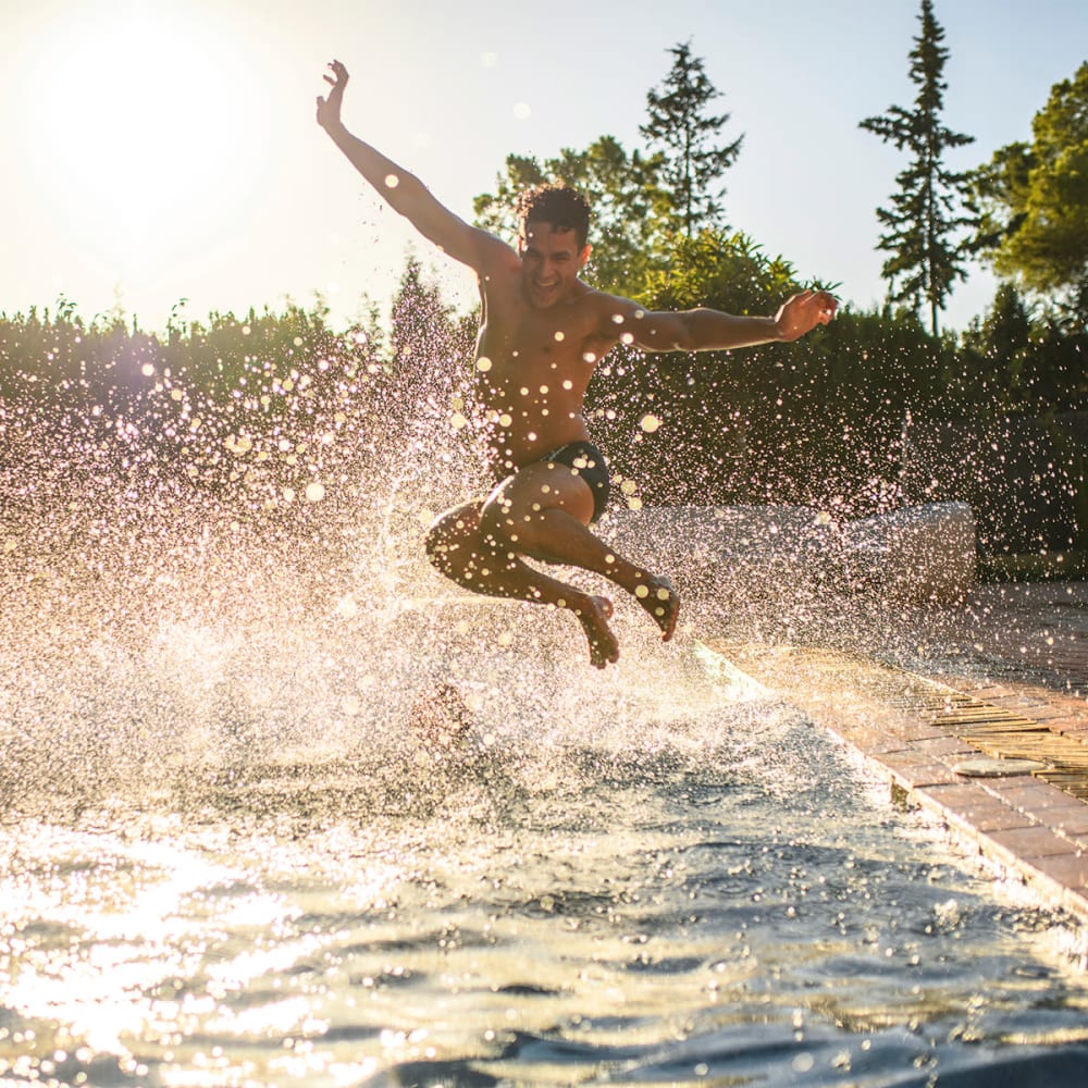 Jumping into the swimming pool at Vista Villa in Charlotte, North Carolina