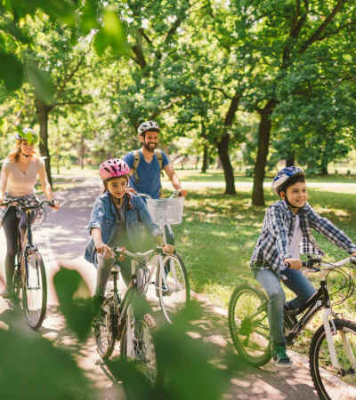 Residents with a bicycle in local park near The Julien in Charlotte, North Carolina