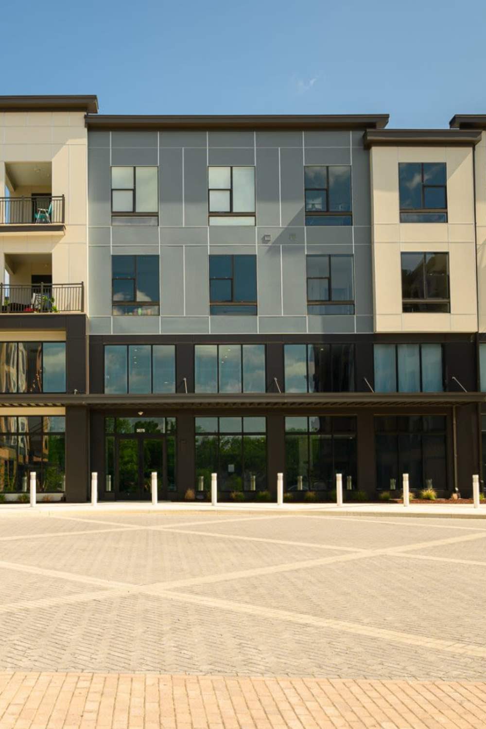 Front entrance with parking lot at The Concord in Wilmington, Delaware