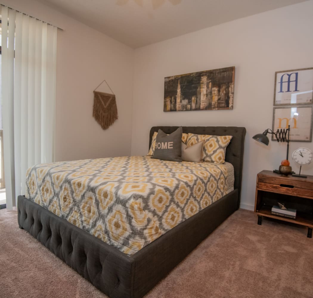 A well decorated bedroom at The Trace of Ridgeland in Ridgeland, Mississippi