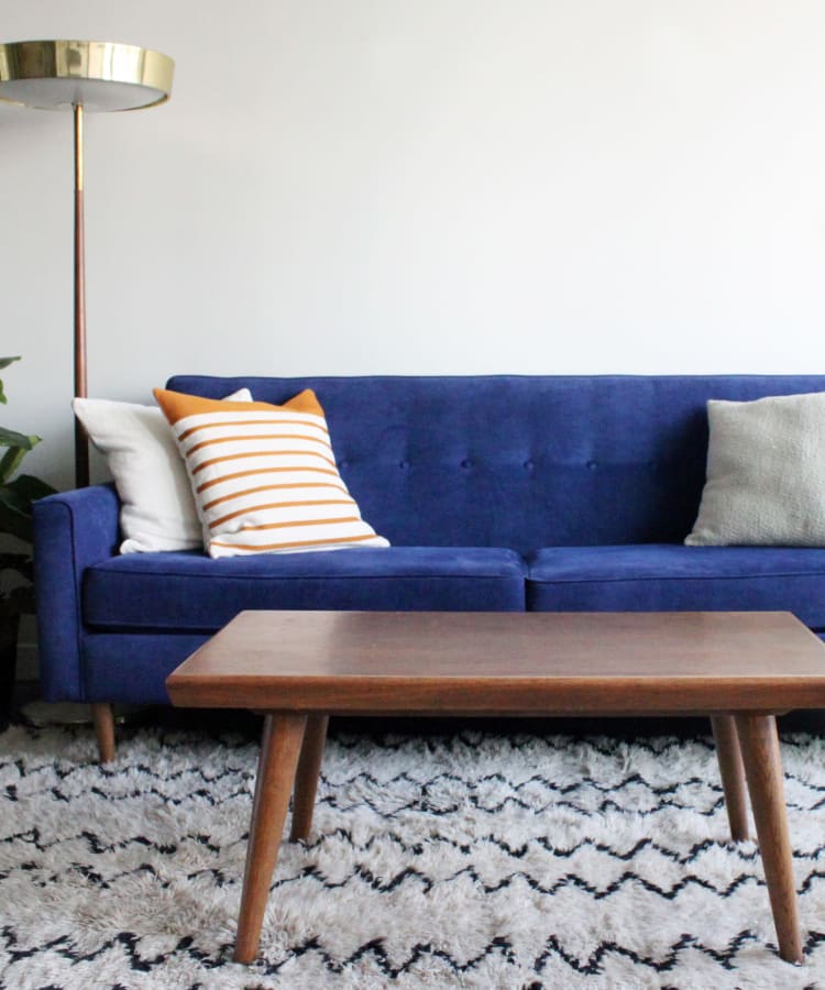 Modern furnishings in the living area of a model home at Sofi Belmont Hills in Belmont, California