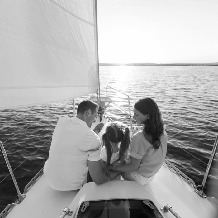 Family on a sailboat near Inscription Channel District in Tampa, Florida