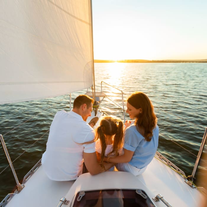 Family on a sailboat near Inscription Channel District in Tampa, Florida