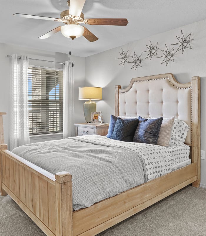 Spacious carpeted bedroom at Cottages at Crestview in Wichita, Kansas