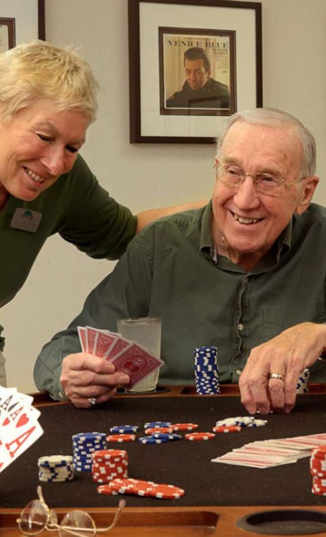 residents playing cards at , MO