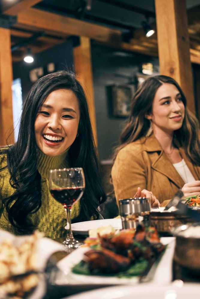 Resident friends eating at a restaurant near Acapella in Las Vegas, Nevada