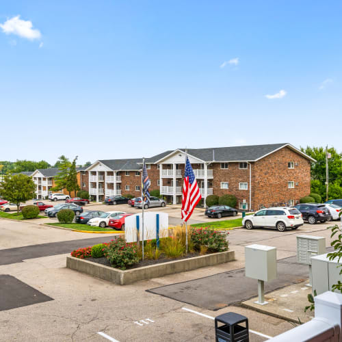 Exterior with plenty of resident and guest parking at Monroe Terrace Apartments in Monroe, Ohio