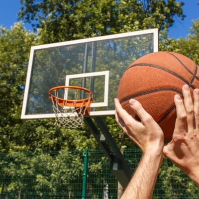 A resident playing basketball at Reagan Park in Lemoore, California
