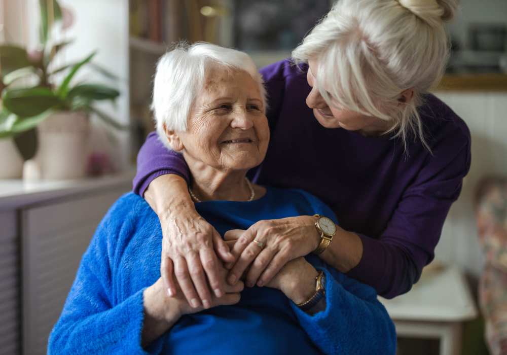 Resident with her caregiver at Clearwater at North Tustin in Santa Ana, California