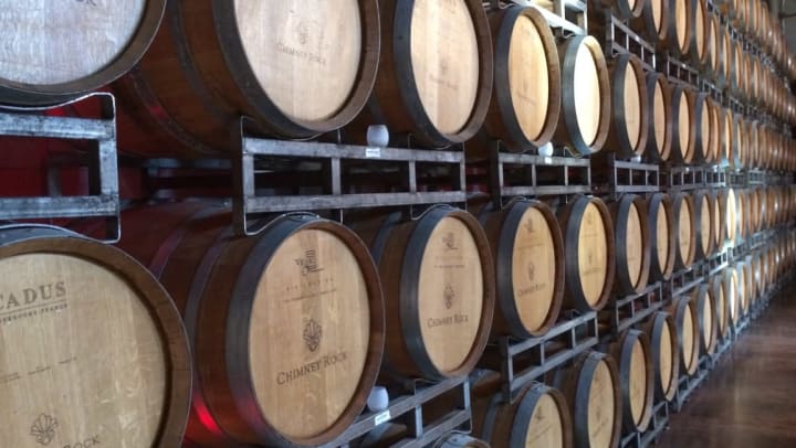 Stacks of wine barrels at Texas Sun Winery near Sundance Creek in Midland, Texas