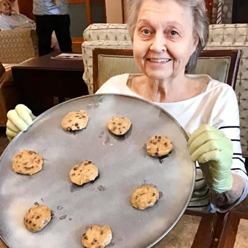 Resident with cookies at Glen Carr House Memory Care in Derby, Kansas
