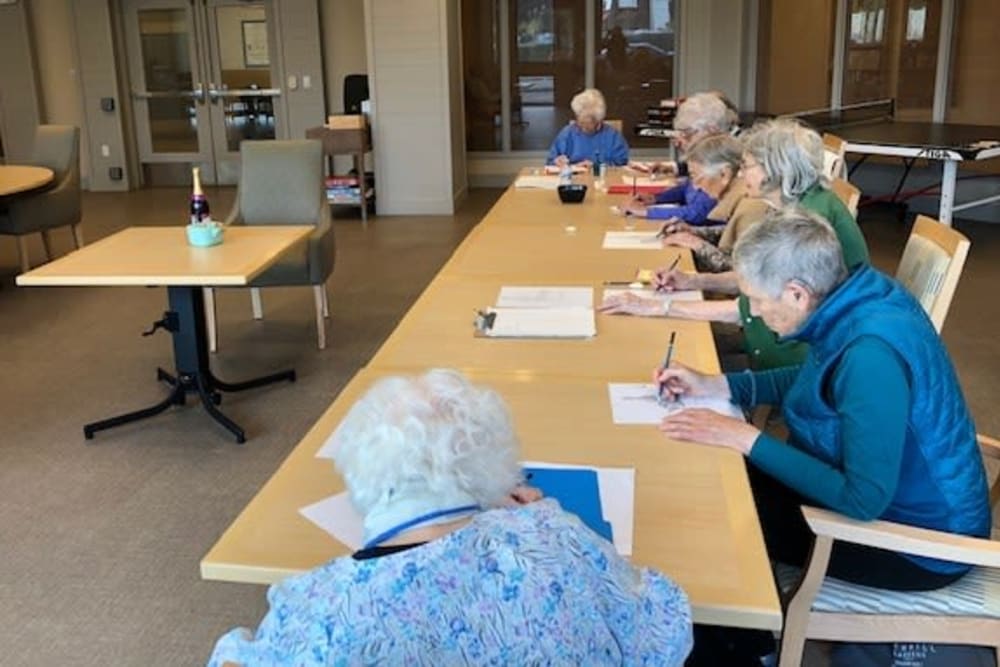 Residents enjoying an advanced art class at Merrill Gardens at Rockridge in Oakland, California
