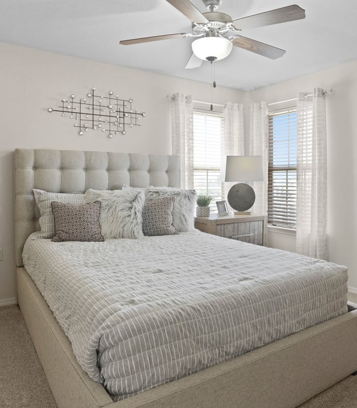 Carpeted bedroom at Watercress Apartments in Maize, Kansas