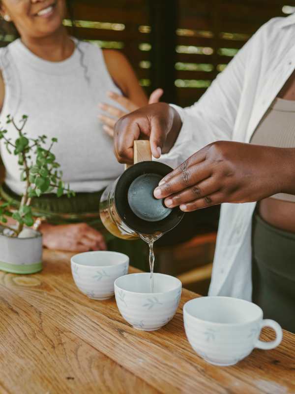 Person preparing tea at Palmhouse Jacksonville in Jacksonville, Florida