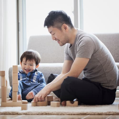 A father playing with his son at Ramona Vista in Ramona, California