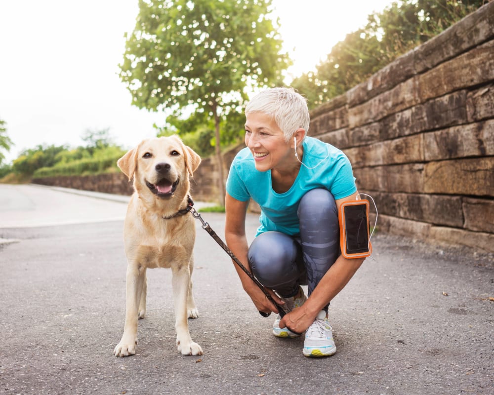 Resident and her dog about to go for a jog near Olympus Northpoint in Albuquerque, New Mexico