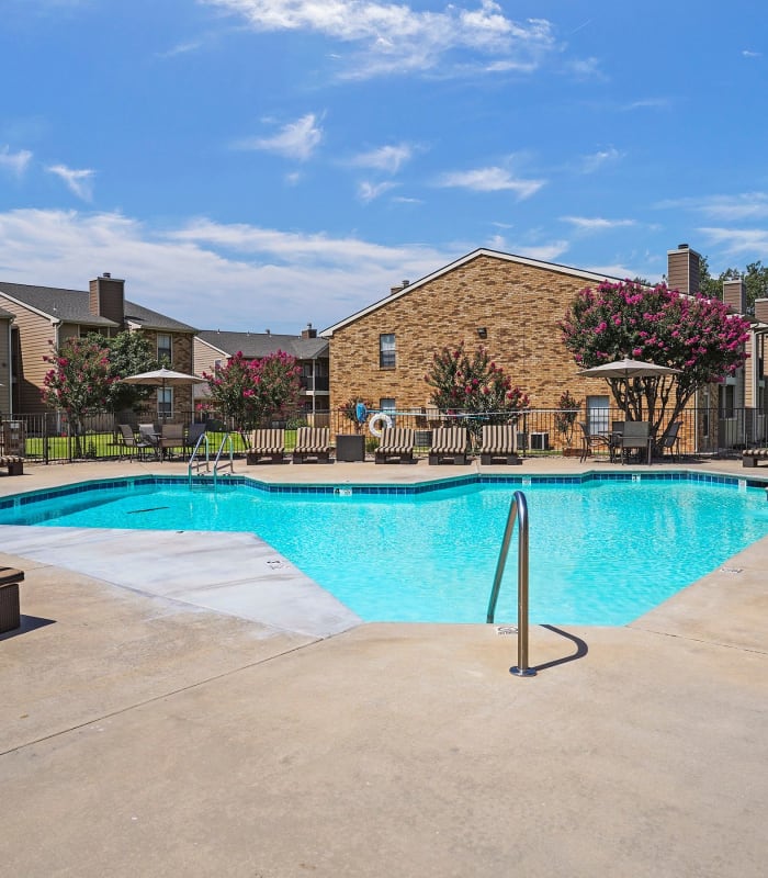 the Spacious pool area at Cimarron Trails Apartments in Norman, Oklahoma