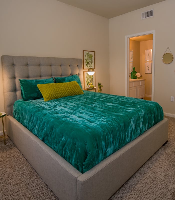 Spacious carpeted bedroom at Lexington Park Apartment Homes in North Little Rock, Arkansas