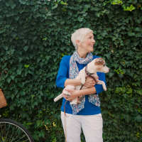 Women with her pet posing at The Reed in Pittsburgh, Pennsylvania