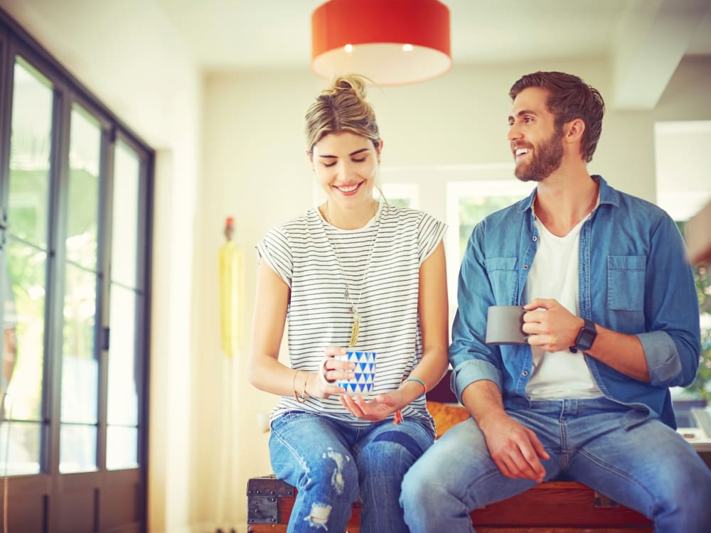 Residents chatting over their morning coffee at Haven Apartment Homes in Kent, Washington