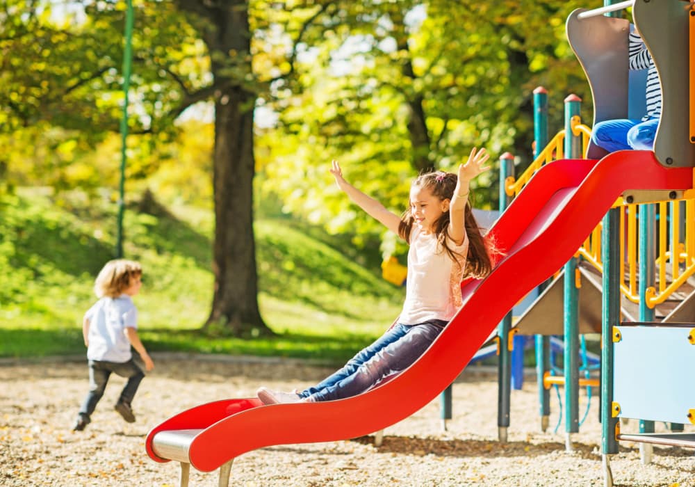 Children playing in the playground at Parkwyn Townhomes in North Richland Hills,Texas