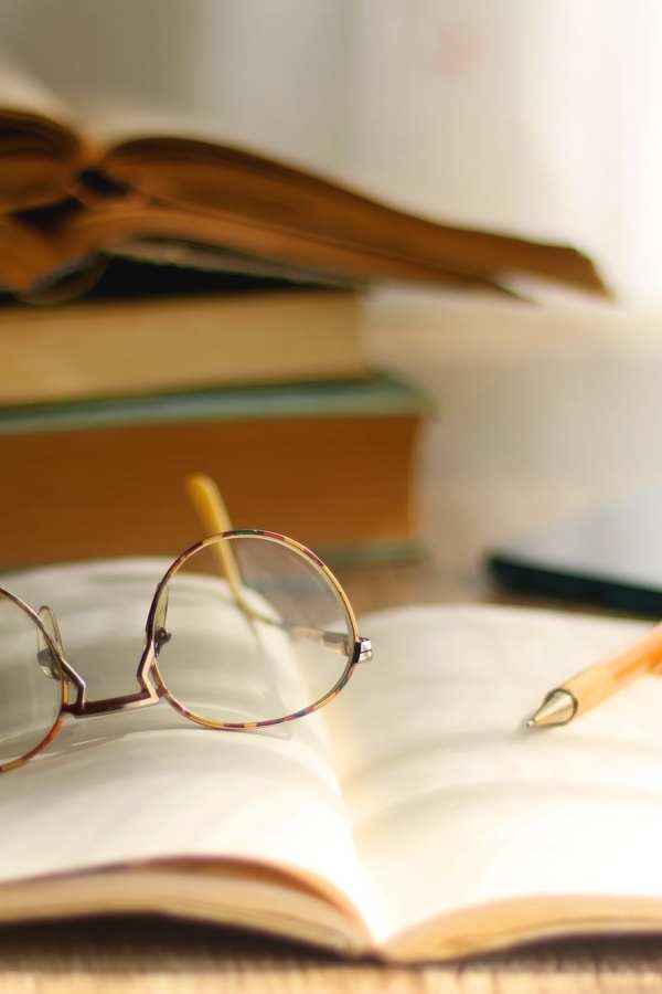 Photo of resident's book and glasses for Merrill Gardens at Tacoma